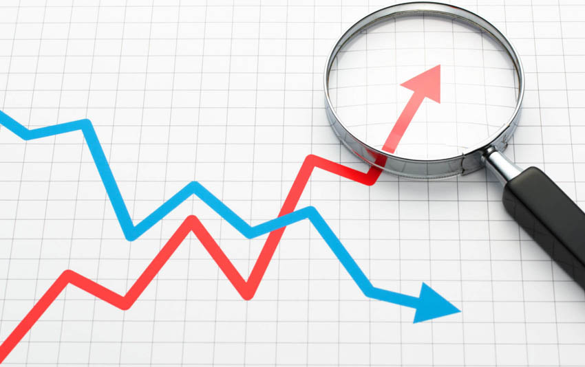 Statistic trends chart with magnifying glass